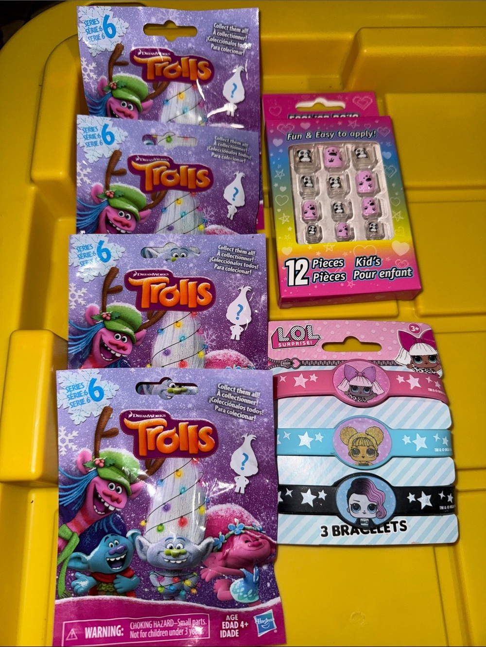 4 pk Trolls series 6 + 1 pk 3 LOL bracelets + 1 pk of fashion nails